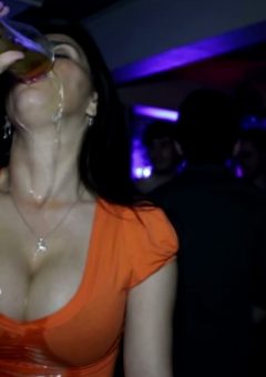 Really thirsty girl drinks full glass of beer in slo-mo